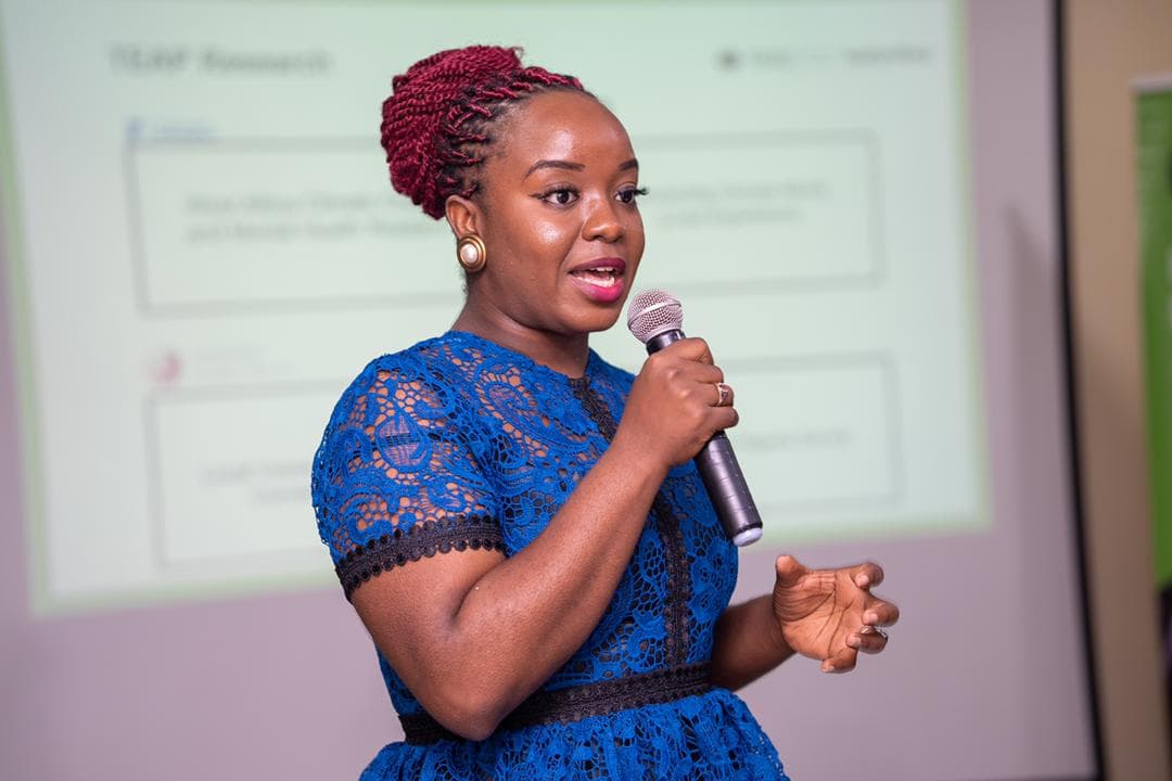 Jennifer Uchendu speaking at an event